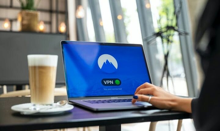 person using black laptop computer