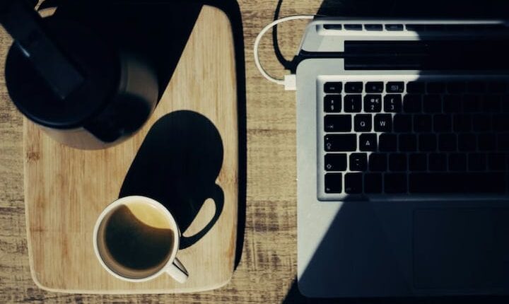 two black and white mugs on rectangular brown tray